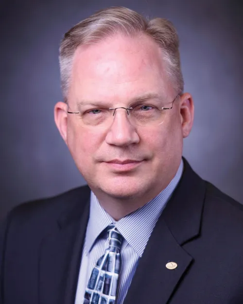 Headshot of Alan P. Branson